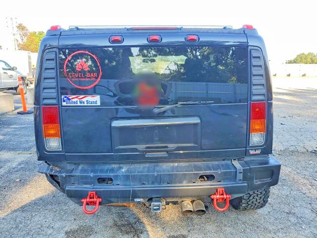 2004 Hummer H2 VIN 5GRGN23U84H112786 COPART salvage auction — REAR END, MO - SALVAGE CERTIFICATE OF TITLE, sold $2,300 on 2026-09-18 (photo 6)