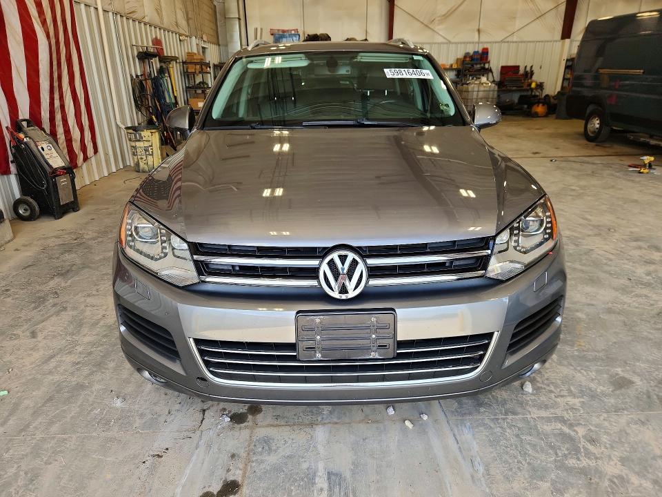 2014 Volkswagen Touareg VIN WVGEF9BP9ED004241 COPART salvage auction — HAIL, Wi - Certificate Of Title, sold $200 on 2026-07-28 (photo 5)