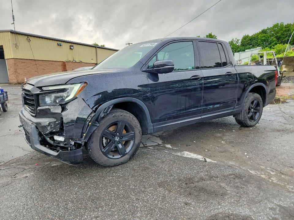 2023 Honda Ridgeline VIN 5FPYK3F80PB042697 — COPART salvage auction photo