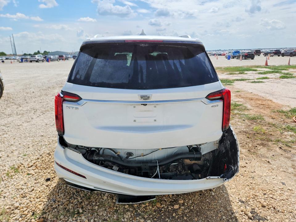 2024 Cadillac Xt6 VIN 1GYKPCRS7RZ719288 COPART salvage auction — SIDE, Tx - Salvage Vehicle Title, sold $2,550 on 2026-07-09 (photo 6)