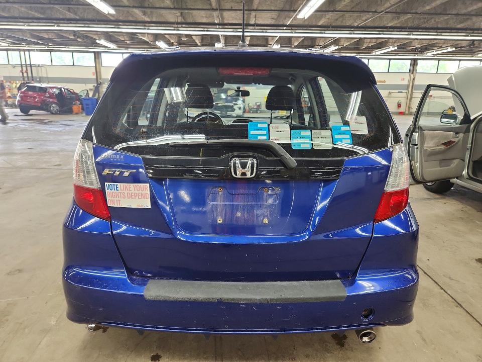 2010 Honda Fit VIN JHMGE8H48AC025023 COPART salvage auction — MINOR DENT/SCRATCHES, Il - Cert Of Title-Rebuilt, sold $1,950 on 2026-07-27 (photo 6)