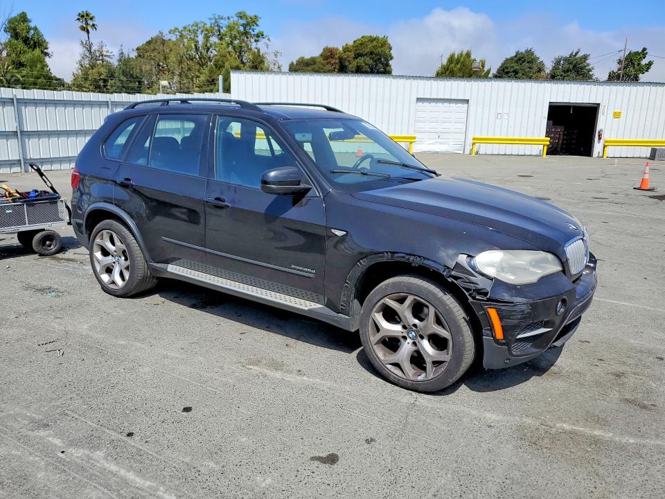 2011 BMW X5 VIN 5UXZW0C52BL661042 COPART salvage auction — FRONT END, FL - DIS/DLR/EXP ONLY CLEAN TITLE, sold $1,900 on 2026-07-10 (photo 4)