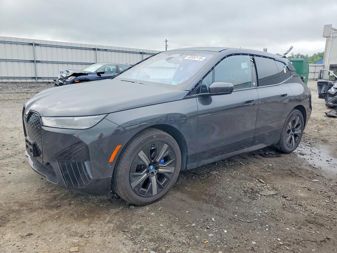 2024 BMW Ix VIN WB523CF08RCP44882 COPART salvage auction — Rear End, VA - CERT OF TITLE - SALVAGE, sold $25,250 on 2026-08-05 (photo 1)