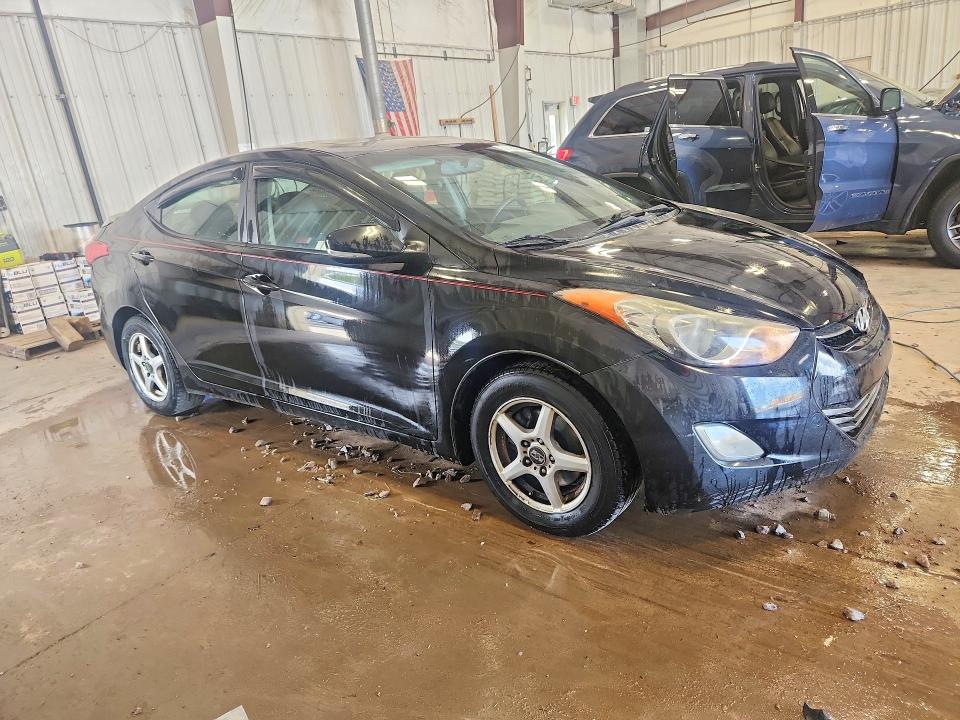 2012 Hyundai Elantra VIN KMHDH4AE7CU191128 COPART salvage auction — REAR END, Wi - Junked Vehicle Bill Of Sale, sold $250 on 2026-07-13 (photo 4)