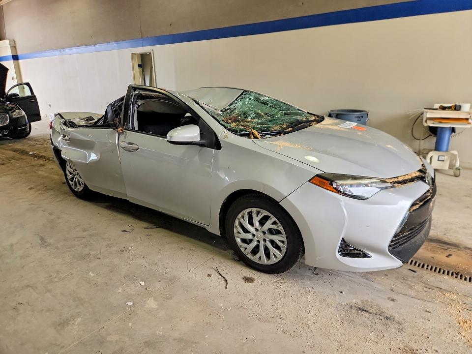 2017 Toyota Corolla VIN 5YFBURHE7HP636711 COPART salvage auction — ALL OVER, VA - CERT OF TITLE - SALVAGE, sold $1,350 on 2026-07-24 (photo 4)