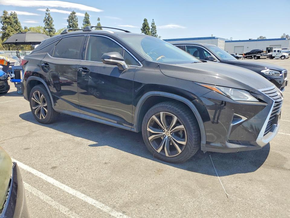 2016 Lexus Rx VIN 2T2BZMCAXGC007480 COPART salvage auction — NORMAL WEAR, CA - DIS/DLR/EXP ONLY CLEAN TITLE, sold $12,200 on 2026-09-03 (photo 4)