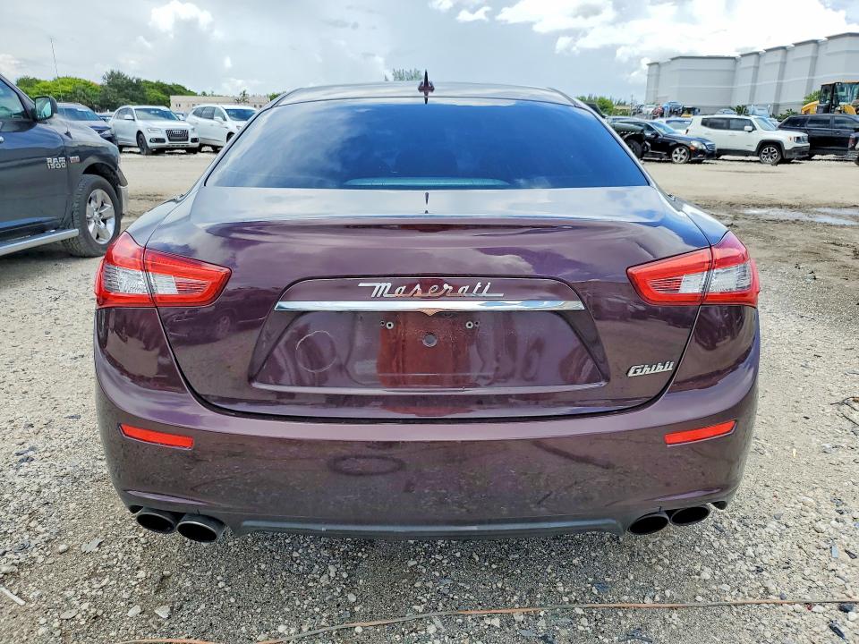 2016 Maserati Ghibli VIN ZAM57XSA0G1173811 COPART salvage auction — MINOR DENT/SCRATCHES, FL - CERT OF TITLE-REBUILT, sold $2,250 on 2026-07-31 (photo 6)