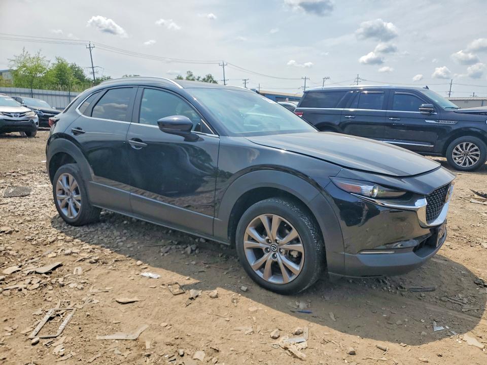 2023 Mazda Cx-30 VIN 3MVDMBBM2PM531160 COPART salvage auction — WATER/FLOOD, Il - Salvage Cert-Flood, sold $8,300 on 2026-09-02 (photo 4)