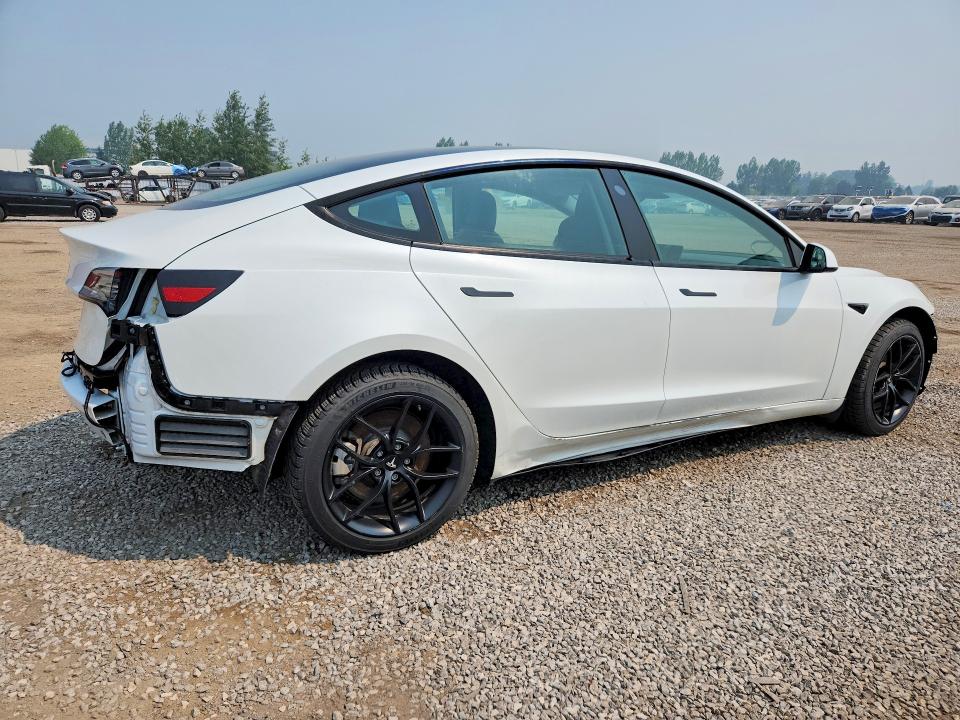 2023 Tesla Model 3 VIN 5YJ3E1EA4PF407014 COPART salvage auction — ALL OVER, ON - PERMIT NO BRAND - UNFIT, sold $3,050 on 2026-07-28 (photo 3)