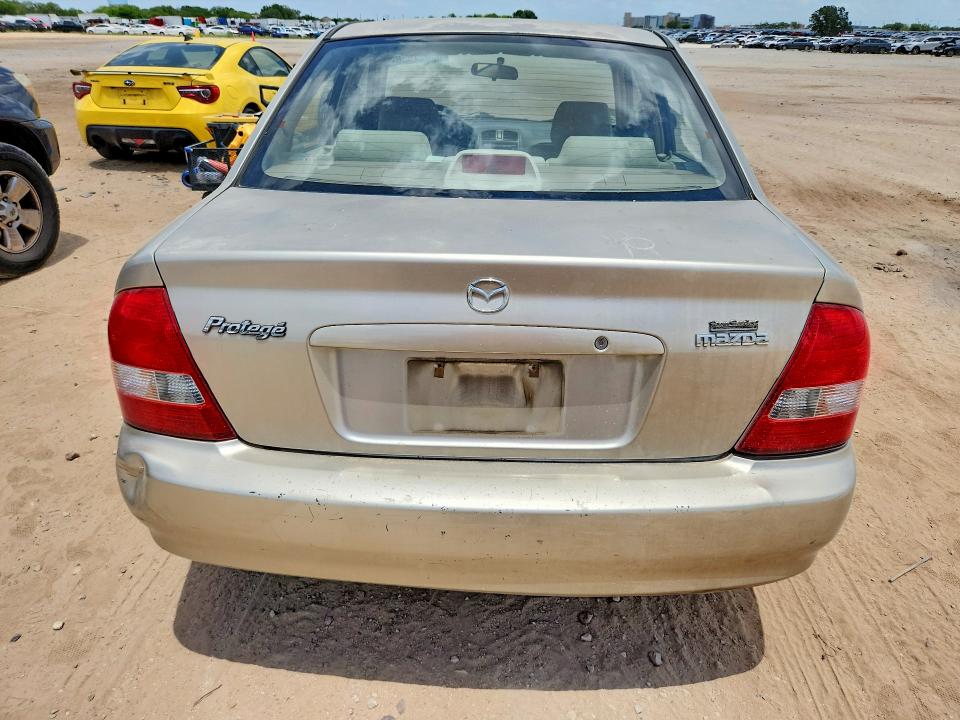 2003 Mazda Protege VIN JM1BJ225731198746 COPART salvage auction — MINOR DENT/SCRATCHES, Tx - Certificate Of Title, sold $450 on 2026-07-09 (photo 6)
