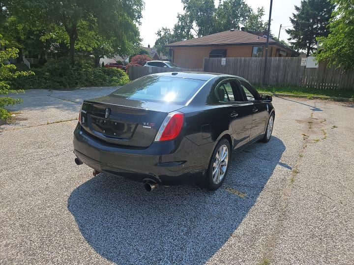 2012 Lincoln Mks VIN 1LNHL9FT8CG806403 COPART salvage auction — NORMAL WEAR, Salvage Title, sold $1,000 on 2026-07-22 (photo 4)