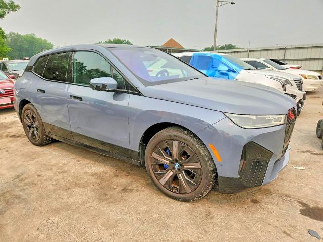 2024 BMW Ix VIN WB523CF02RCP02238 COPART salvage auction — REAR END, Fl - Cert Of Title Slvg Rebuildable, sold $23,700 on 2026-07-28 (photo 4)