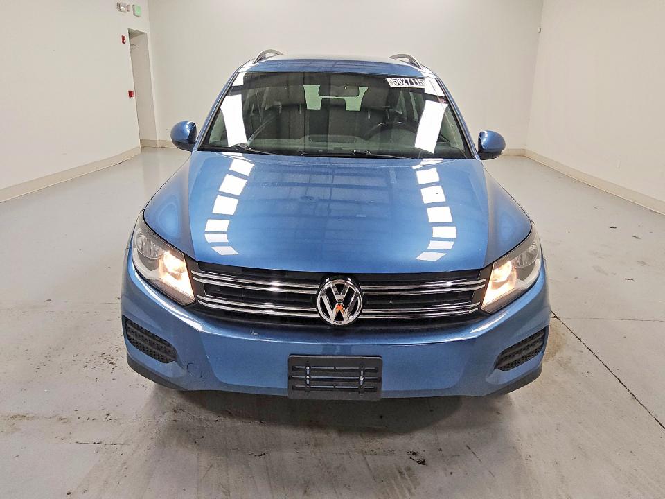 2018 Volkswagen Tiguan VIN WVGAV7AX4JK000045 COPART salvage auction — MINOR DENT/SCRATCHES, Wv - Certificate Of Title, sold $6,800 on 2026-07-14 (photo 5)