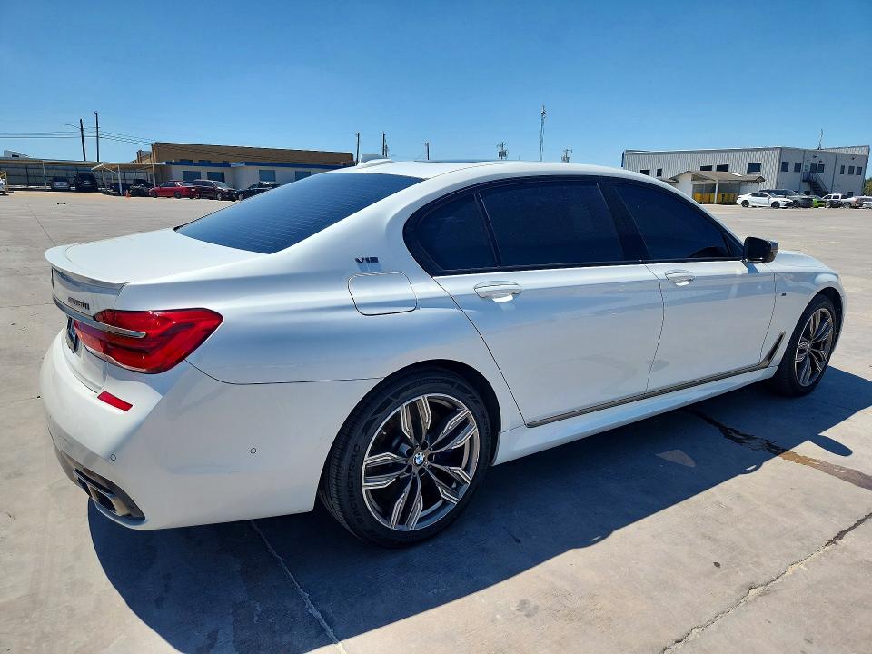 2019 BMW M760i xdrive VIN WBA7H6C58KG615050 COPART salvage auction — NORMAL WEAR, TX - SALVAGE VEHICLE TITLE (P), sold $8,600 on 2026-07-30 (photo 3)