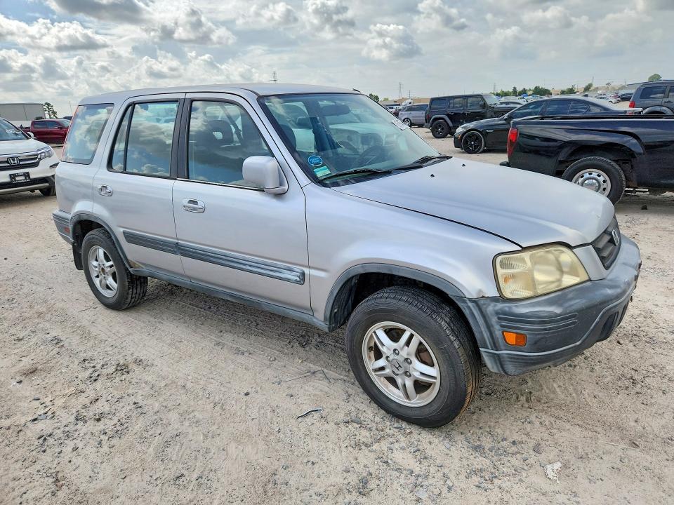 2001 Honda Cr-v VIN JHLRD18621S029809 COPART salvage auction — VANDALISM, TX - SALVAGE VEHICLE TITLE (P), sold $625 on 2026-07-10 (photo 4)