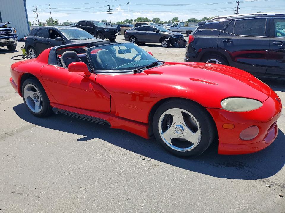 1994 Dodge Viper VIN 1B3BR65E2RV100205 COPART salvage auction — MINOR DENT/SCRATCHES, ID - SALVAGE CERTIFICATE OF TITLE, sold $16,600 on 2026-07-12 (photo 4)
