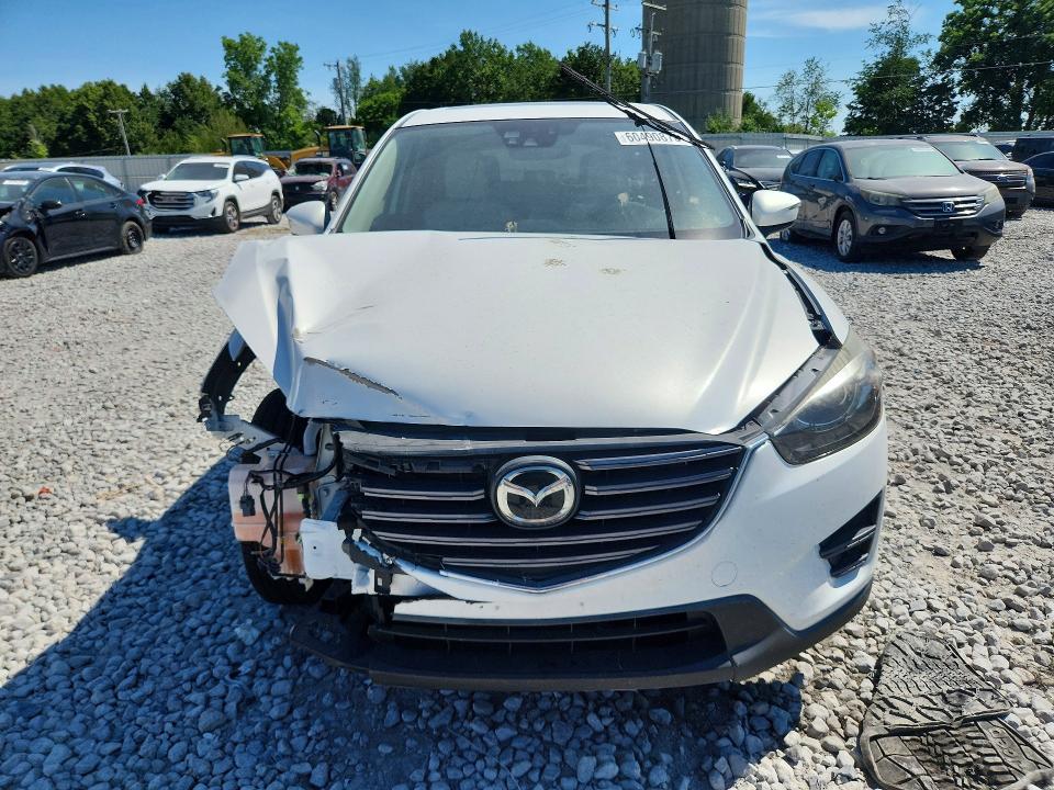 2016 Mazda Cx-5 VIN JM3KE4DY8G0736025 COPART salvage auction — FRONT END, Mi - Certificate Of Title, sold $1,500 on 2026-07-23 (photo 5)