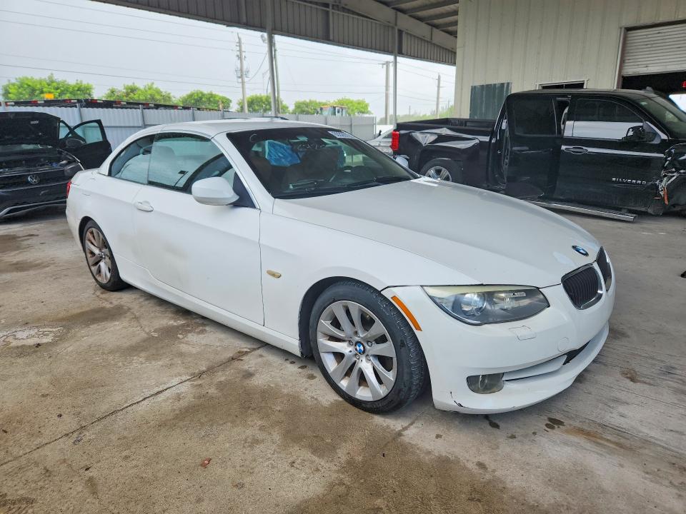2012 BMW 3 series VIN WBADW7C5XCE730048 COPART salvage auction — MINOR DENT/SCRATCHES, FL - CERT OF TTL-REBUILT&SLVG RBLD, sold $825 on 2026-07-29 (photo 4)