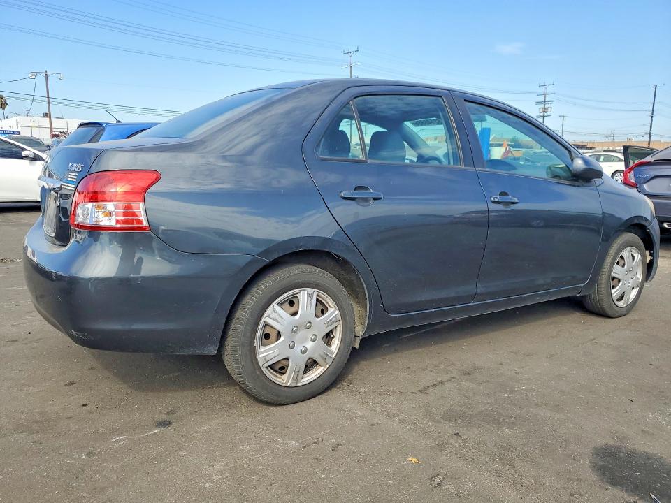2010 Toyota Yaris VIN JTDBT4K32A4069118 COPART salvage auction — MINOR DENT/SCRATCHES, Ca - Acq Bos - Post Sale - Salvage, sold $225 on 2026-07-27 (photo 3)