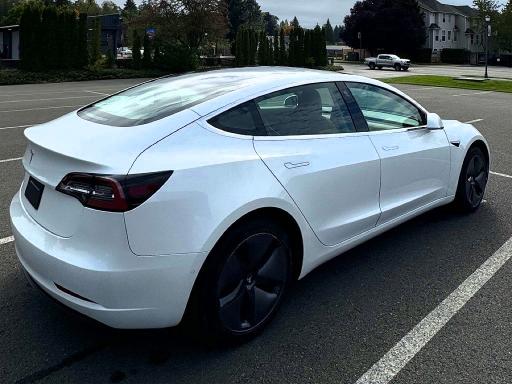 2020 Tesla Model 3 VIN 5YJ3E1EA9LF613004 COPART salvage auction — DAMAGE HISTORY, WA - CERT OF OWNERSHIP-REBUILT (P), sold $6,100 on 2026-07-31 (photo 4)