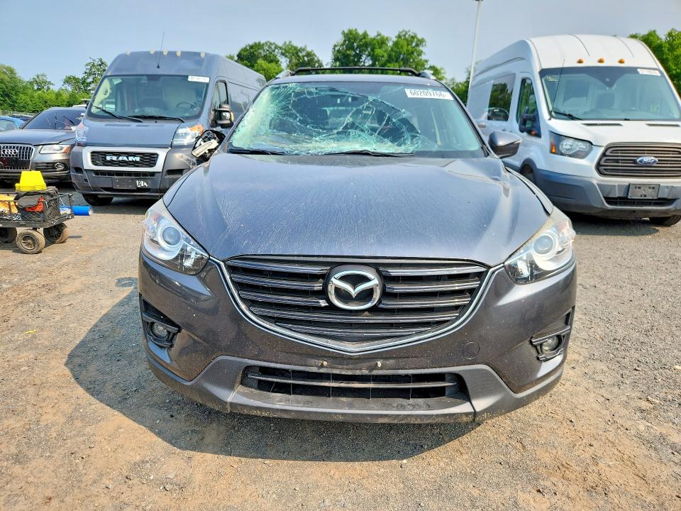2016 Mazda Cx-5 VIN JM3KE4CY4G0871956 COPART salvage auction — SIDE, Ct - Cert Of Title-Salvage, sold $2,700 on 2026-07-23 (photo 5)