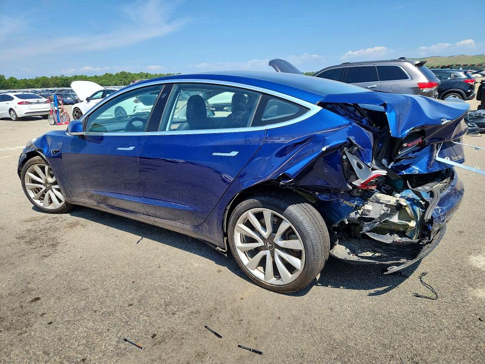 2018 Tesla Model 3 VIN 5YJ3E1EBXJF116047 COPART salvage auction — REAR END, Ny - Mv-907A Salvage Certificate, sold $1,700 on 2026-07-20 (photo 2)