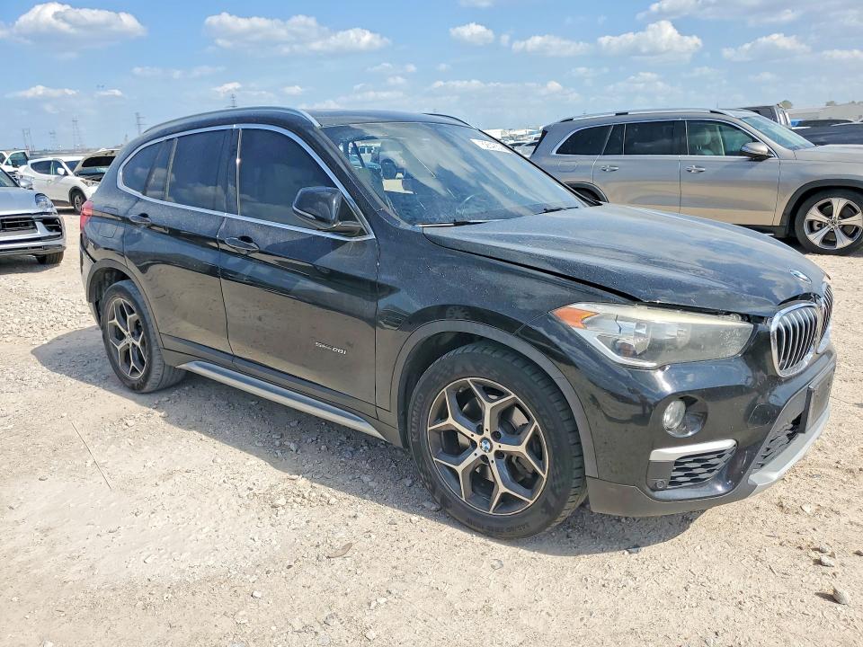 2017 BMW X1 VIN WBXHU7C33H5H37560 COPART salvage auction — SIDE, Tx - Salvage Vehicle Title, sold $1,950 on 2026-08-04 (photo 4)
