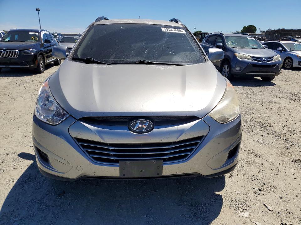 2011 Hyundai Tucson VIN KM8JU3AC7BU193659 COPART salvage auction — SIDE, CA - DIS/DLR/EXP ONLY CLEAN TITLE, sold $3,273 on 2026-07-09 (photo 5)