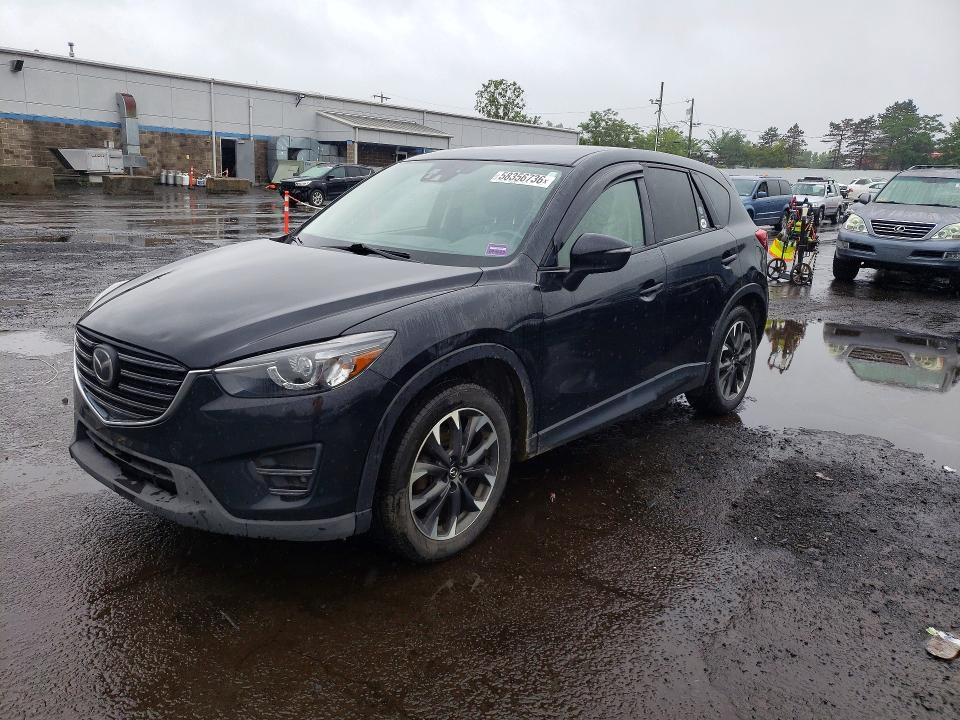 2016 Mazda VIN JM3KE4DY5G0909760 COPART salvage auction — SIDE, CT - CERT OF TITLE-SALVAGE, sold $3,550 on 2026-07-10 (photo 1)
