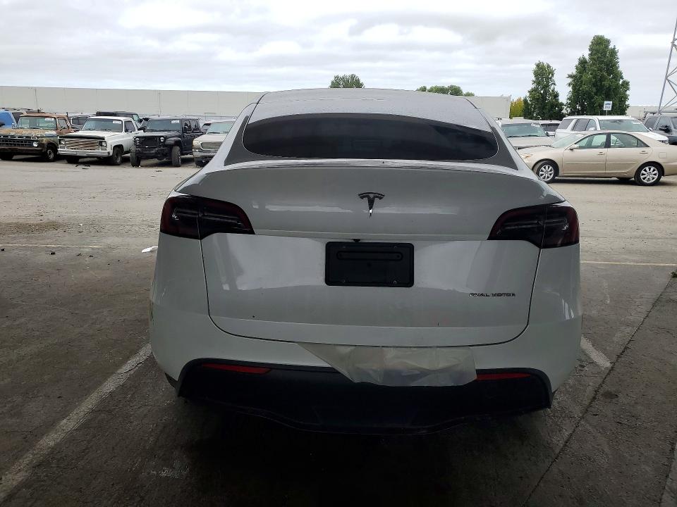 2023 Tesla Model y VIN 7SAYGDEEXPF742575 COPART salvage auction — FRONT END, CA - SALVAGE CERTIFICATE, sold $6,400 on 2026-07-16 (photo 6)