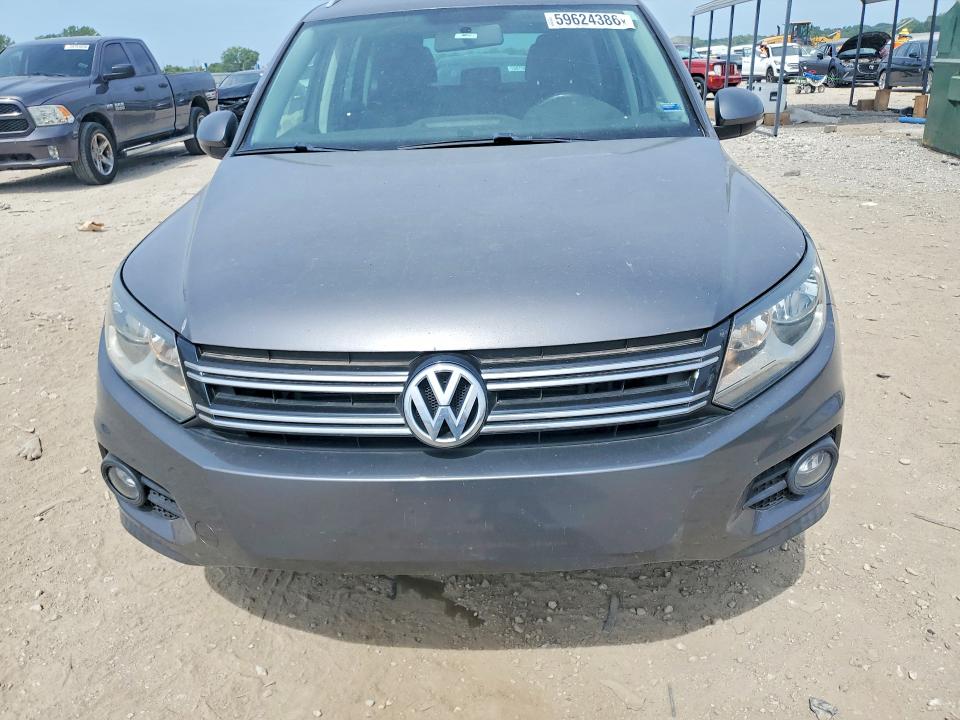 2012 Volkswagen Tiguan VIN WVGAV7AXXCW004158 COPART salvage auction — SIDE, Ks - Cert Of Title-Salvage, sold $1,100 on 2026-08-11 (photo 5)