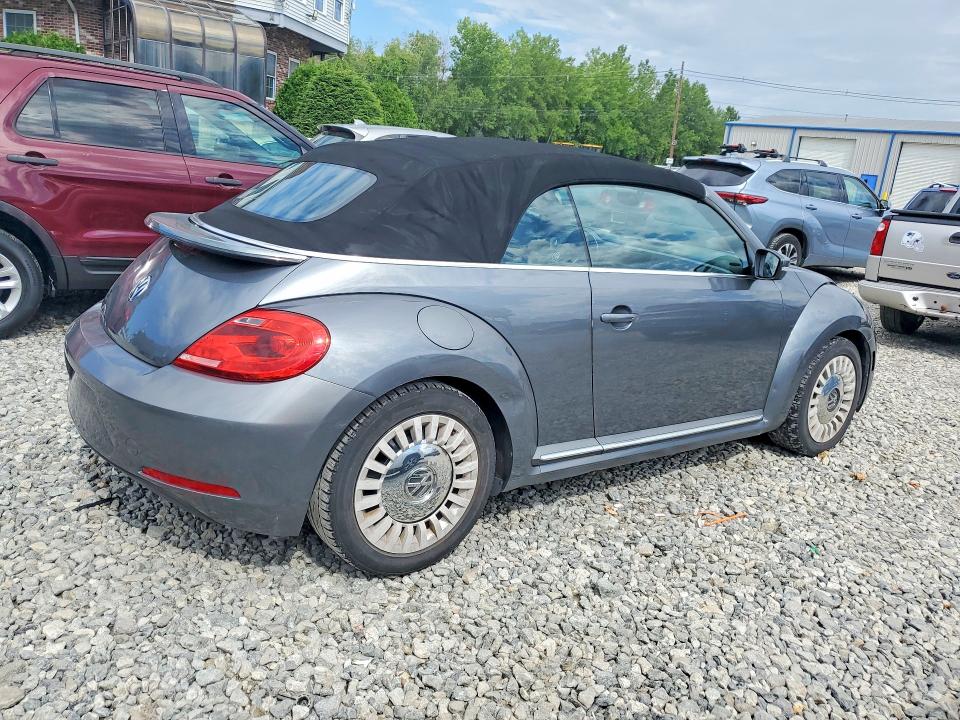 2014 Volkswagen Beetle VIN 3VW5P7AT7EM802744 COPART salvage auction — NORMAL WEAR, Ma - Certificate Of Title, sold $1,650 on 2026-08-27 (photo 3)