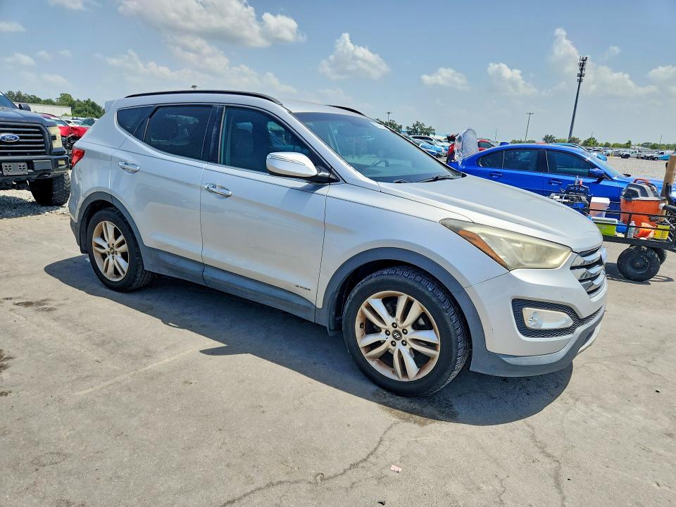 2014 Hyundai Santa fe VIN 5XYZU3LA4EG159946 COPART salvage auction — MINOR DENT/SCRATCHES, Fl - Certificate Of Title, sold $2,600 on 2026-07-20 (photo 4)