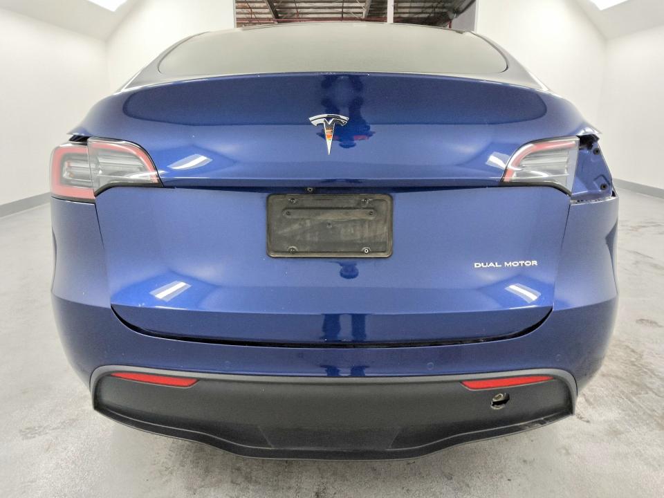 2022 Tesla Model y VIN 7SAYGDEE3NF481237 COPART salvage auction — SIDE, NV - CERTIFICATE OF TITLE, sold $9,700 on 2026-07-20 (photo 6)