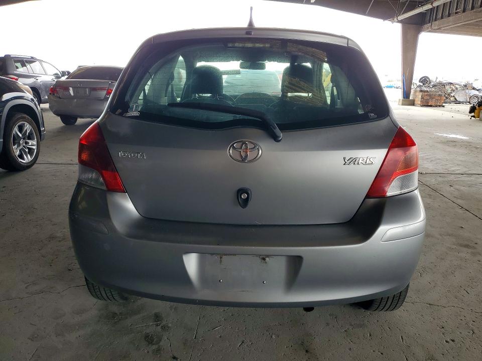 2011 Toyota Yaris VIN JTDJT4K36B5337014 COPART salvage auction — ROOF, CA - DIS/DLR/EXP ONLY CLEAN TITLE, sold $2,250 on 2026-07-16 (photo 6)