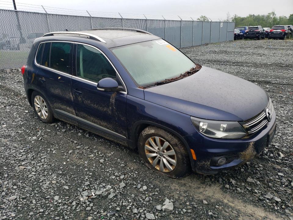 2014 Volkswagen Tiguan VIN WVGJV3AXXEW624990 COPART salvage auction — WATER/FLOOD, Ns - Cert Of Registration, sold $225 on 2026-08-13 (photo 4)