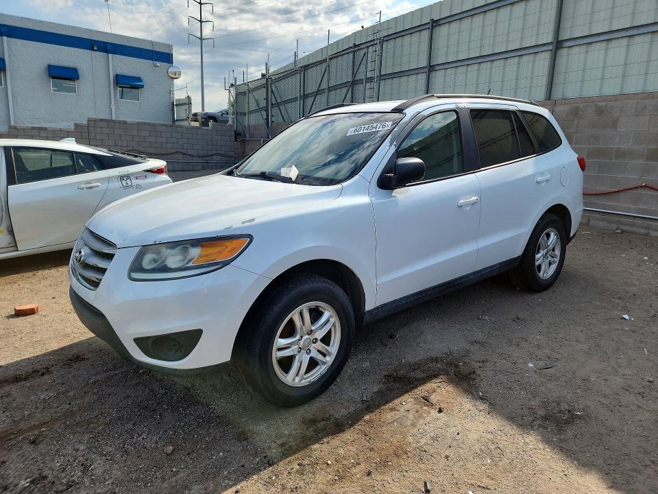 2012 Hyundai Santa fe VIN 5XYZGDAB6CG124024 COPART salvage auction — FRONT END, Nm - Certificate Of Title, sold $1,300 on 2026-07-13 (photo 1)