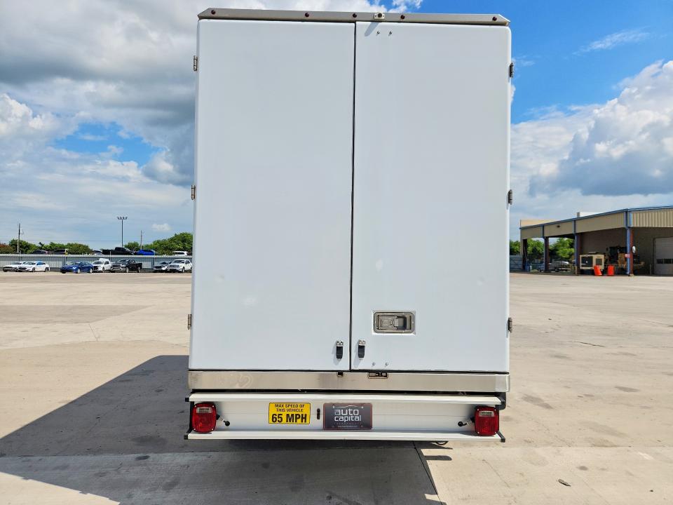 2023 Ford Econoline VIN 1FDWE3FKXPDD00813 COPART salvage auction — NORMAL WEAR, TX - CERTIFICATE OF TITLE, sold $9,400 on 2026-07-29 (photo 6)