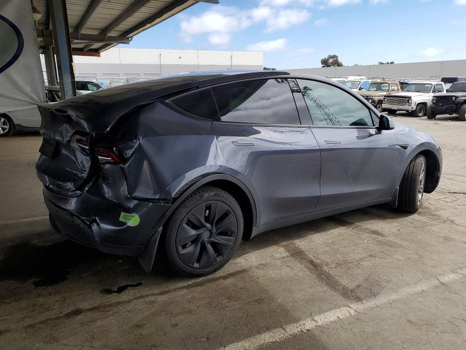 2023 Tesla Model y VIN 7SAYGDEE5PF635305 COPART salvage auction — REAR END, Ca - Salvage Certificate, sold $7,600 on 2026-07-14 (photo 3)
