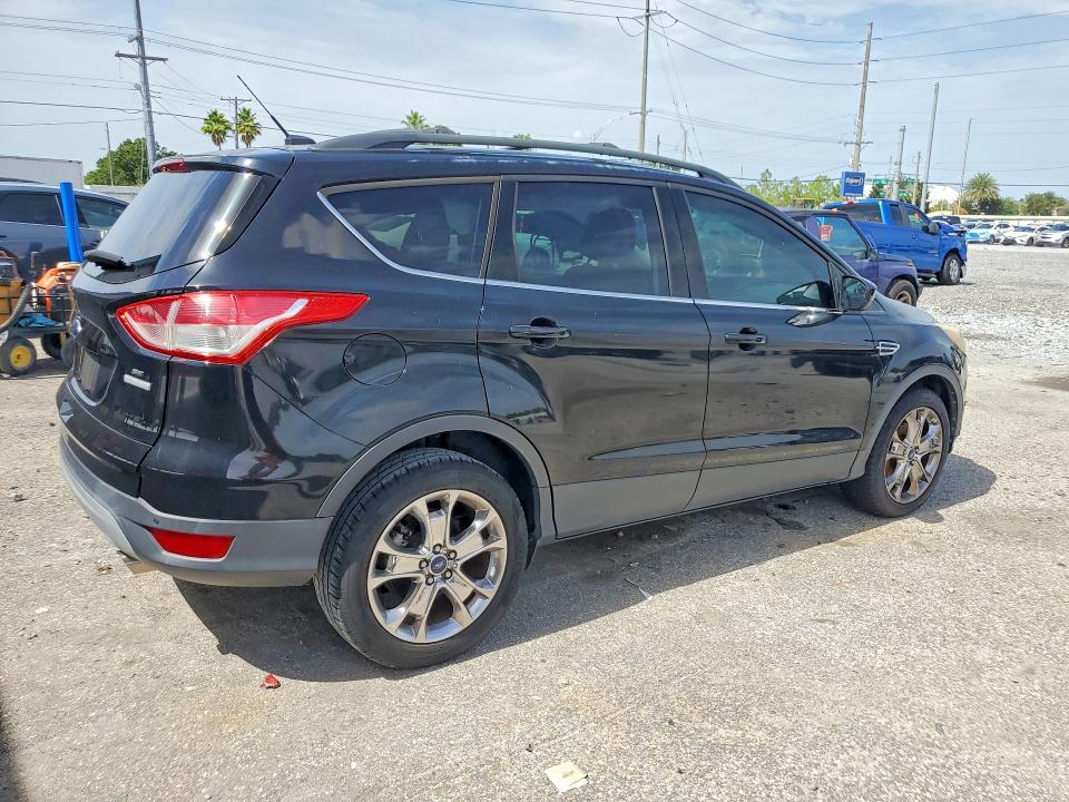2016 Ford Escape VIN 1FMCU0GX5GUC20236 COPART salvage auction — SIDE, Fl - Cert Of Title Slvg Rebuildable, sold $850 on 2026-07-31 (photo 3)