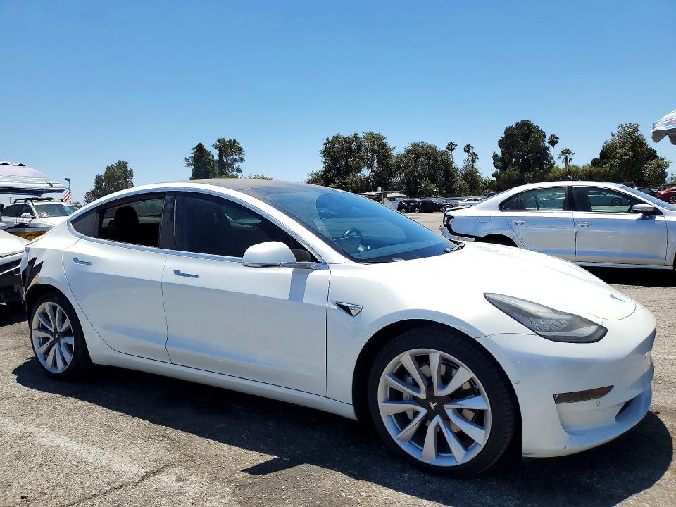 2019 Tesla Model 3 VIN 5YJ3E1EA3KF326952 COPART salvage auction — REAR END, Ca - Salvage Certificate, sold $7,200 on 2026-07-24 (photo 4)