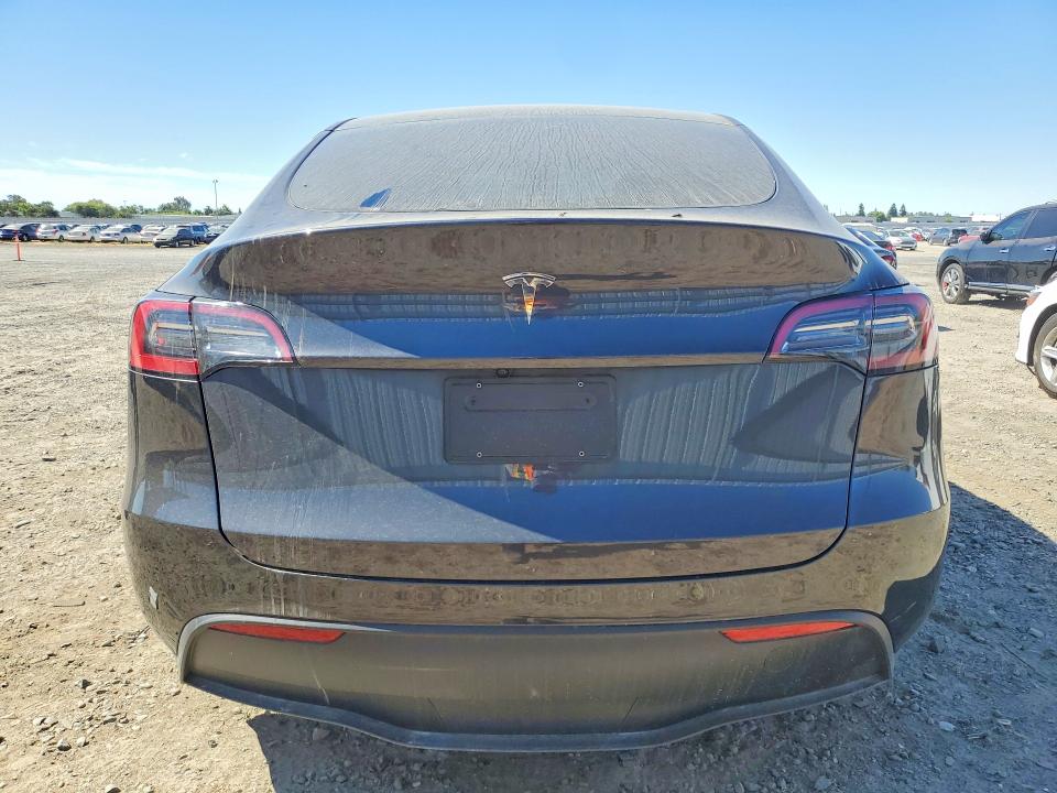 2025 Tesla Model y VIN 7SAYGDED2SF259629 COPART salvage auction — DAMAGE HISTORY, Ca - Salvage Certificate (P), sold $15,800 on 2026-07-28 (photo 6)