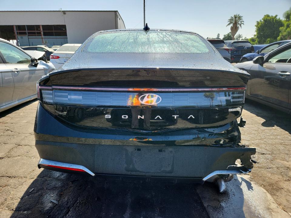 2026 Hyundai Sonata hybrid VIN KMHL24JJ0TA153459 COPART salvage auction — REAR END, CA - NON-REPAIRABLE VEHICLE CERT, sold $8,800 on 2026-08-19 (photo 6)