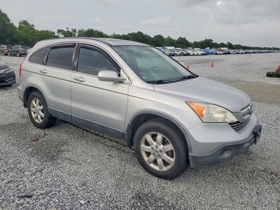 2009 Honda Cr-v VIN JHLRE38739C011133 COPART salvage auction — NORMAL WEAR, TX - CERTIFICATE OF TITLE, sold $800 on 2026-07-27 (photo 4)