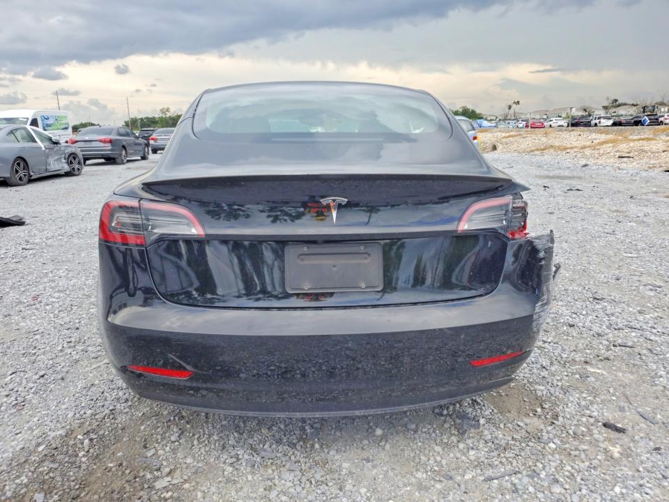 2023 Tesla Model 3 VIN 5YJ3E1EA9PF691269 COPART salvage auction — REAR END, Fl - Certificate Of Destruction, sold $8,300 on 2026-07-28 (photo 6)