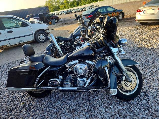 2001 Harley-davidson Flhtpi VIN 1HD1FMW111Y615930 COPART salvage auction — MINOR DENT/SCRATCHES, Wi - Certificate Of Title, sold $600 on 2026-07-27 (photo 1)