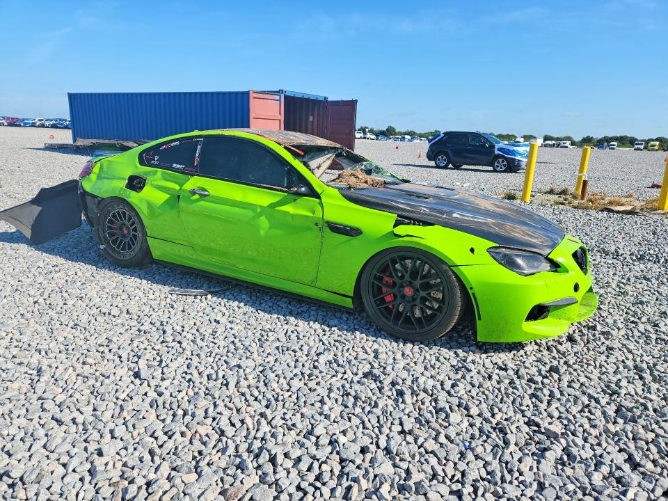 2014 BMW M6 VIN WBSLX9C51ED160188 COPART salvage auction — ALL OVER, FL - CERT OF TITLE SLVG REBUILDABLE, sold $6,600 on 2026-07-14 (photo 4)