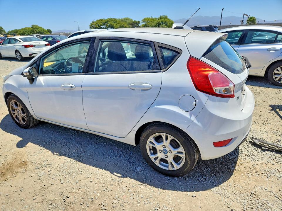 2014 Ford Fiesta VIN 3FADP4EJ1EM121636 COPART salvage auction — MINOR DENT/SCRATCHES, Ca - Dis/Dlr/Exp Only Clean Title, sold $300 on 2026-07-10 (photo 2)