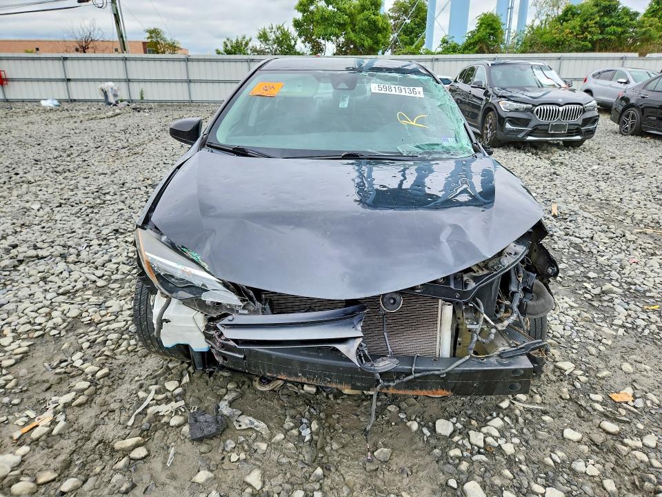 2019 Toyota Corolla VIN 5YFBURHE6KP861662 COPART salvage auction — ALL OVER, NJ - CERT OF TITLE-SALVAGE (P), sold $1,050 on 2026-07-22 (photo 5)