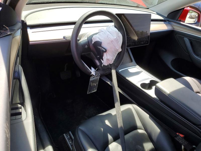 2023 Tesla Model y VIN 7SAYGDEE8PF674535 COPART salvage auction — FRONT END, WA - BILL OF SALE, sold $6,700 on 2026-07-27 (photo 8)